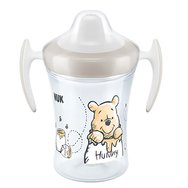Nuk Trainer Cup 6m + Мечо Пух 230ml - Учебна чаша с мека муцуна и ръце за деца от 6 месеца и нагоре Nuk Trainer Cup 6m + Мечо Пух 230ml - Учебна чаша с мека муцуна и ръце за деца от 6 месеца и нагоре
